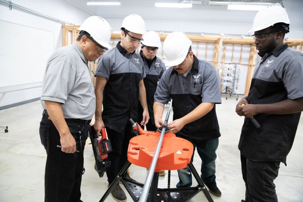 Electrician Technician Program - UEI's Electrician Training Program offers comprehensive training for a rewarding career in as little as 10 months. Students learn to install, maintain, and repair electrical systems in residential and commercial settings. With a hybrid approach combining online learning and hands-on lab training, students gain practical skills in wiring, safety protocols, electrical theory, NEC code requirements, and more. The program covers diverse topics including low voltage applications, motors, programmable logic controllers, and solar panels. Upon completion, graduates are prepared for entry-level roles as electrician technicians. If you're interested in pursuing a career as an electrician, consider enrolling in UEI's program for a fast-track to success. Contact UEI to begin your journey in the electrician trade. Electrician Technician Program - UEI's Electrician Training Program offers comprehensive training for a rewarding career in as little as 10 months. Students learn to install, maintain, and repair electrical systems in residential and commercial settings. With a hybrid approach combining online learning and hands-on lab training, students gain practical skills in wiring, safety protocols, electrical theory, NEC code requirements, and more. The program covers diverse topics including low voltage applications, motors, programmable logic controllers, and solar panels. Upon completion, graduates are prepared for entry-level roles as electrician technicians. If you're interested in pursuing a career as an electrician, consider enrolling in UEI's program for a fast-track to success. Contact UEI to begin your journey in the electrician trade.