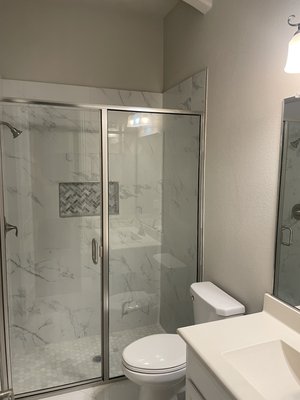 Triple bathroom remodel project. - This remodel was done to replace existing “cookie cutter” subdivision tile with premium materials for a more elegant look. Triple bathroom remodel project. - This remodel was done to replace existing “cookie cutter” subdivision tile with premium materials for a more elegant look.