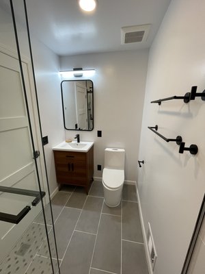 Bathroom remodel - An old bathroom with serious leaking issues. We help the client fix the leaking issues and fully renovate the bathroom at $15,000. From permit checking to final clean-up, we handle everything for the client. We can help you transform the old house into a stylish and functional space that suits your needs. Upgrade your home with our expert renovation services.