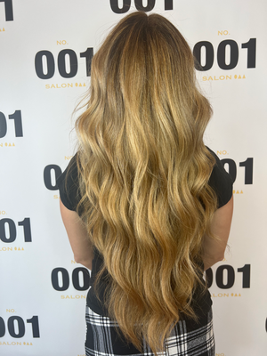 Hair Extensions - At 001 Salon we use Bellami hair extensions and we offer different Extension options such as Tape-In, Keratin Bonds, I-TIP, and Tied Wefts. A complimentary consultation with one of our Extension Specialists is required to book. We cannot quote over the phone or via email. Please call us to schedule a consultation.
Tape-in Extensions
TAPE-IN extensions, this method provides a secure and comfortable feel as well as easy removal and reapplication to the Guest’s hair. Great for all hair types especially clients with thin hair, as tapes lay flat against the head and are virtually undetectable. It is highly recommended for finer and textured hair. Tape-Ins are reinstalled every 6-9 weeks. The advantage of tape-ins is the hair is reusable which can last from 6-12 months. The application process takes about 2 hours.
Tied Weft
Tied WEFT extensions are installed by creating a beaded foundation and sewing in the weft extensions for voluminous full coverage. This method allows for easy removal and reapplication to the guest’s hair. Great for clients with dense hair that want full coverage of their natural hair. Weft extensions are recommended for clients with thicker hair or adds more fullness for clients with thinner hair. Weft extensions have to move up every 6-8 weeks and reinstall every 12-16 weeks. Application process takes up to 3 hours. Achieve seamless length and volume with BELLAMI Professional Hand-Tied Wefts! Crafted with the highest quality 100% Remy human hair, these lightweight veils are hand-knotted with fine thread & designed to lay close to the scalp for maximum comfort.
Keratin Bond
KERATIN-Bond extensions are installed with a heating tool that bonds a silicone additive to the natural hair for free movement and naturally layered texture. Great for all hair types because the attachment is very small and can be customized by cutting the hair extension to be virtually undetectable. This method is perfect for someone who loves to put their hair up and go as it provides flexible movement. K-Bond are single-strand “keratin infused hair”, it wears up to 4-6 months. The application process takes 3-6 hours, but it is worth it. K-Bond are great for someone who wants to be low maintenance. They stay in your hair until they’re ready to be taken out with no move-ups required. K-Bond are great for active lifestyles! You can be all sweaty and oily, but this K-Tips extension will hold up.
I-TIP
I-TIP extensions are installed using strand by strand beaded application for maximum versatility and movement along with easy removal and reapplication to the guest’s hair. Great for someone who loves to put their hair up and go as it provides flexible movement. I-Tips are single-strand hair with higher maintenance required. The extension has to move up every 6-8 weeks, and reinstall every 12-16 weeks for beautiful volume. An advantage for I-Tips is that the hair is reusable. Application process takes up to 3 hours. Hair Extensions - At 001 Salon we use Bellami hair extensions and we offer different Extension options such as Tape-In, Keratin Bonds, I-TIP, and Tied Wefts. A complimentary consultation with one of our Extension Specialists is required to book. We cannot quote over the phone or via email. Please call us to schedule a consultation.
Tape-in Extensions
TAPE-IN extensions, this method provides a secure and comfortable feel as well as easy removal and reapplication to the Guest’s hair. Great for all hair types especially clients with thin hair, as tapes lay flat against the head and are virtually undetectable. It is highly recommended for finer and textured hair. Tape-Ins are reinstalled every 6-9 weeks. The advantage of tape-ins is the hair is reusable which can last from 6-12 months. The application process takes about 2 hours.
Tied Weft
Tied WEFT extensions are installed by creating a beaded foundation and sewing in the weft extensions for voluminous full coverage. This method allows for easy removal and reapplication to the guest’s hair. Great for clients with dense hair that want full coverage of their natural hair. Weft extensions are recommended for clients with thicker hair or adds more fullness for clients with thinner hair. Weft extensions have to move up every 6-8 weeks and reinstall every 12-16 weeks. Application process takes up to 3 hours. Achieve seamless length and volume with BELLAMI Professional Hand-Tied Wefts! Crafted with the highest quality 100% Remy human hair, these lightweight veils are hand-knotted with fine thread & designed to lay close to the scalp for maximum comfort.
Keratin Bond
KERATIN-Bond extensions are installed with a heating tool that bonds a silicone additive to the natural hair for free movement and naturally layered texture. Great for all hair types because the attachment is very small and can be customized by cutting the hair extension to be virtually undetectable. This method is perfect for someone who loves to put their hair up and go as it provides flexible movement. K-Bond are single-strand “keratin infused hair”, it wears up to 4-6 months. The application process takes 3-6 hours, but it is worth it. K-Bond are great for someone who wants to be low maintenance. They stay in your hair until they’re ready to be taken out with no move-ups required. K-Bond are great for active lifestyles! You can be all sweaty and oily, but this K-Tips extension will hold up.
I-TIP
I-TIP extensions are installed using strand by strand beaded application for maximum versatility and movement along with easy removal and reapplication to the guest’s hair. Great for someone who loves to put their hair up and go as it provides flexible movement. I-Tips are single-strand hair with higher maintenance required. The extension has to move up every 6-8 weeks, and reinstall every 12-16 weeks for beautiful volume. An advantage for I-Tips is that the hair is reusable. Application process takes up to 3 hours.