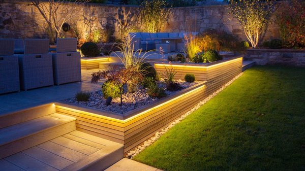 Outdoor lighting - This project was to install various Landscape lights along the front of this property. Each bush has its own spot light.