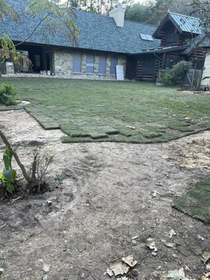 Back yard Country serenity - We met Joni outside of work. We instantly had a connection. After she learned I owned a Landscaping company she was interested in getting a free quote . I visited her beautiful " Santuario " her new cabin home. I installed additional sprinkler zones to the existing sprinkler system. Installation was to cover the back yard grass area. We graded and sloped the back yard areas first. After, we installed sod . Beautiful Bermuda grass since she has high traffic coming and going apart from her grandkids her farm animals walk their way up and down that beautiful back yard. We installed bendable edging in her flower beds. Created a beautiful walk way. She was so pleased with our work that she called us back to re-do her front house, flagstone walk way and her decomposed granite top layer drive ways. Back yard Country serenity - We met Joni outside of work. We instantly had a connection. After she learned I owned a Landscaping company she was interested in getting a free quote . I visited her beautiful " Santuario " her new cabin home. I installed additional sprinkler zones to the existing sprinkler system. Installation was to cover the back yard grass area. We graded and sloped the back yard areas first. After, we installed sod . Beautiful Bermuda grass since she has high traffic coming and going apart from her grandkids her farm animals walk their way up and down that beautiful back yard. We installed bendable edging in her flower beds. Created a beautiful walk way. She was so pleased with our work that she called us back to re-do her front house, flagstone walk way and her decomposed granite top layer drive ways.