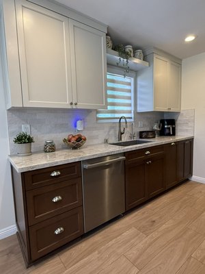Kitchen remodel - This remodel was done on an outdated kitchen that needed some love. We gutted the entire kitchen opened up the walls added flush beam to give this kitchen a more open feel, completely rebuilding everything down to the studs and adding all new electrical and plumbing to ensure this kitchen will last for years to come. 
The custom cabinets tied in perfectly with the custom countertops and beautiful tile that gives this kitchen some character and charm. The owner absolutely loves cooking there now.