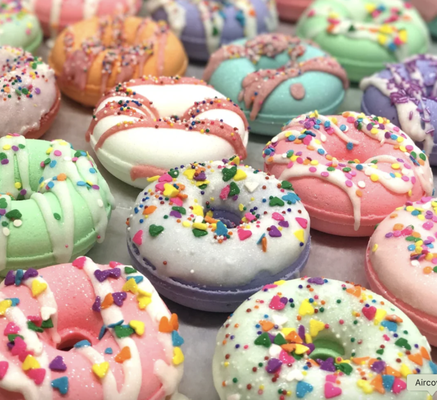 Bath Bombs - Contains: Baking soda, citric acid, cornstarch, shea butter, coconut oil & certified organic sustainable palm oil, cocoa butter, fragrance, eco-glitter mica, colorant and candy sprinkles