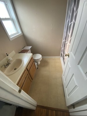 Bathroom Remodel - This client reached out to us to remodel this bathroom for her since she used a wheelchair and it was hard for her to get around in the small space. Out the existing vanity, flooring, baseboard, and doors that swung into the bathroom and replaced everything with a space saving alternative. Add a nice barn door to finish it off. Bathroom Remodel - This client reached out to us to remodel this bathroom for her since she used a wheelchair and it was hard for her to get around in the small space. Out the existing vanity, flooring, baseboard, and doors that swung into the bathroom and replaced everything with a space saving alternative. Add a nice barn door to finish it off.
