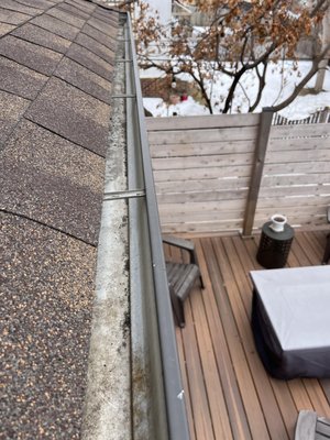 Gutter Cleaning - We offer full wash and clean and downspout flushing. We use hooks on our ladders to safely place on your roofs.