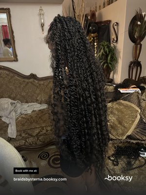 Style: Passion Twist - Passion twist style with criss cross up top with added curls Style: Passion Twist - Passion twist style with criss cross up top with added curls