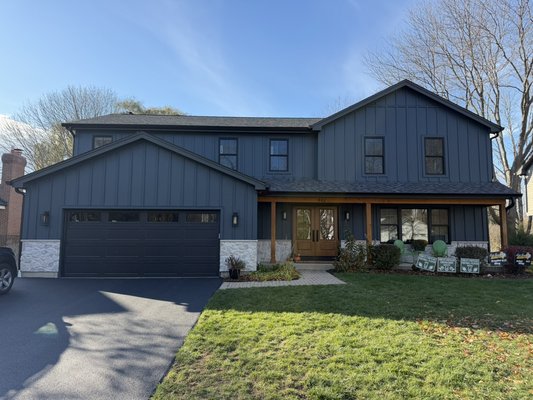 GRAYSLAKE BEAUTY - ONE OF MY FAVORITES IN 2025 - This Grayslake “Beauty” features a “Custom” painted James Hardie Board & Batten exterior with “Iron Gray” accents & stone water table, Marvin “Elevate” Black on Black Fiberglass windows, black gutters & downspouts, Custom Provia Entry System’s & Cedar accents. We loved this transformation and this customer, It was a super fun project. GRAYSLAKE BEAUTY - ONE OF MY FAVORITES IN 2025 - This Grayslake “Beauty” features a “Custom” painted James Hardie Board & Batten exterior with “Iron Gray” accents & stone water table, Marvin “Elevate” Black on Black Fiberglass windows, black gutters & downspouts, Custom Provia Entry System’s & Cedar accents. We loved this transformation and this customer, It was a super fun project.