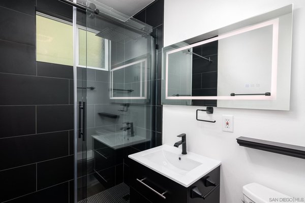 Hillcrest Retreat: Revitalization of Bathroom, Laundry Nook, and Bedroom - Welcome to 'Hillcrest Retreat,' an exquisite residential project by Apex Ridge Construction, nestled in the vibrant heart of Hillcrest, San Diego. Immerse yourself in the epitome of modern living as we embark on a comprehensive renovation journey, seamlessly blending luxury, functionality, and style across your bathroom, bedroom, and laundry nook.
Indulge in the allure of a contemporary bathroom designed for ultimate relaxation. 'Hillcrest Retreat' boasts a modern sanctuary featuring custom tile work, creating a spa-like ambiance bathed in ample natural light. Every detail is meticulously crafted to elevate your daily routine and provide a haven of comfort.
In the bedroom, experience the transformation with the addition of sliding barn doors gracing expansive closets. These stylish and practical elements not only optimize space but also infuse a touch of rustic elegance into your modern retreat. The flooring, adorned with new vinyl, ensures a harmonious blend of aesthetics and durability, offering a seamless and easy-to-maintain solution for your living spaces.
At Apex Ridge Construction, our commitment is to curate homes that resonate with your lifestyle, marrying form with function. Join us in creating the 'Hillcrest Retreat' – a sanctuary where modern design converges with timeless elegance, right here in Hillcrest, San Diego. Elevate your living experience and embark on a journey of transformation with us. Hillcrest Retreat: Revitalization of Bathroom, Laundry Nook, and Bedroom - Welcome to 'Hillcrest Retreat,' an exquisite residential project by Apex Ridge Construction, nestled in the vibrant heart of Hillcrest, San Diego. Immerse yourself in the epitome of modern living as we embark on a comprehensive renovation journey, seamlessly blending luxury, functionality, and style across your bathroom, bedroom, and laundry nook.
Indulge in the allure of a contemporary bathroom designed for ultimate relaxation. 'Hillcrest Retreat' boasts a modern sanctuary featuring custom tile work, creating a spa-like ambiance bathed in ample natural light. Every detail is meticulously crafted to elevate your daily routine and provide a haven of comfort.
In the bedroom, experience the transformation with the addition of sliding barn doors gracing expansive closets. These stylish and practical elements not only optimize space but also infuse a touch of rustic elegance into your modern retreat. The flooring, adorned with new vinyl, ensures a harmonious blend of aesthetics and durability, offering a seamless and easy-to-maintain solution for your living spaces.
At Apex Ridge Construction, our commitment is to curate homes that resonate with your lifestyle, marrying form with function. Join us in creating the 'Hillcrest Retreat' – a sanctuary where modern design converges with timeless elegance, right here in Hillcrest, San Diego. Elevate your living experience and embark on a journey of transformation with us.