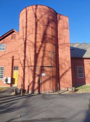 Historical silo repair in Enfield NH - This historical silo in Enfield NH was standing on its last leg when we got called to give a consultation work was started not long after and consisted building a internal frame to add stability to the structure filled by removing and replacing all rotted and compromised framing followed by tounge and groove siding that doubles as the framing as well followed by repairing the original doors and installing new hardware and a touch of new paint on the immediately affected areas Historical silo repair in Enfield NH - This historical silo in Enfield NH was standing on its last leg when we got called to give a consultation work was started not long after and consisted building a internal frame to add stability to the structure filled by removing and replacing all rotted and compromised framing followed by tounge and groove siding that doubles as the framing as well followed by repairing the original doors and installing new hardware and a touch of new paint on the immediately affected areas