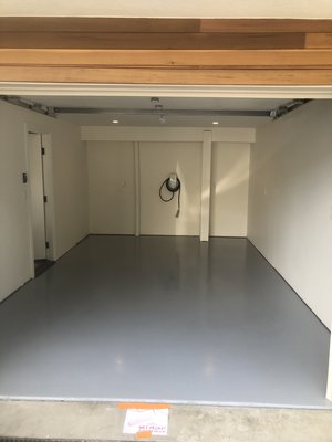 Epoxy garage floor - This whole house was painted by us and the garage floor was in bad conditions so we grind the floors and filled cracks and holes, sanded for a smooth finish and apply epoxy paint. We also installed drywall in some openings from electrical work and did (level 4) in garage ceiling and walls and (level 5) in the hallway since it was in bad shape