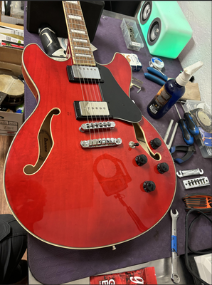 Guitar Repair - This repair was a complete replacement of electronics. Full restring and setup. Guitar Repair - This repair was a complete replacement of electronics. Full restring and setup.
