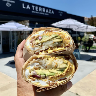 Breakfast Burritos - La Terraza Cafe is a local coffee house specializing in a variety of coffee based drinks, fresh juice, pastries, salads, soups and sandwiches. Our goal is to provide the community with a place to gather and enjoy delicious drinks and food. La Terraza Cafe also serves as a local art gallery and performance space available to local artists and musicians. The owners of La Terraza Cafe are not new to the area and heavily involved in the community.
Call or visit us today to place your order! Breakfast Burritos - La Terraza Cafe is a local coffee house specializing in a variety of coffee based drinks, fresh juice, pastries, salads, soups and sandwiches. Our goal is to provide the community with a place to gather and enjoy delicious drinks and food. La Terraza Cafe also serves as a local art gallery and performance space available to local artists and musicians. The owners of La Terraza Cafe are not new to the area and heavily involved in the community.
Call or visit us today to place your order!