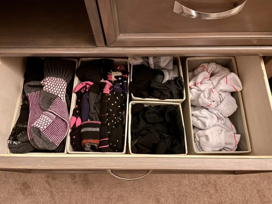 Dresser Drawer Organization - Using something as simple as drawer dividers and rolling the clothing really helps these drawers appear more neat. Now everything can be seen and accessed easily.