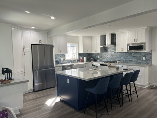 Home Remodel - This project was done in the summer of 2022 in the city of Hawthrone. Customer called us for an estimate for new kitchen cabinets. After going over ideas and what can be done, they made the ultimate decision to knock down walls for an open concept living space with a brand new kitchen. At the end of the project we rewired the whole house with a new 200 amp panel. New flooring, New LED lighting throughout house, custom built cabinets, new countertops, paint interior of home, new baseboard and trim and new laundry room.
Call or text us today for your free quote! Home Remodel - This project was done in the summer of 2022 in the city of Hawthrone. Customer called us for an estimate for new kitchen cabinets. After going over ideas and what can be done, they made the ultimate decision to knock down walls for an open concept living space with a brand new kitchen. At the end of the project we rewired the whole house with a new 200 amp panel. New flooring, New LED lighting throughout house, custom built cabinets, new countertops, paint interior of home, new baseboard and trim and new laundry room.
Call or text us today for your free quote!