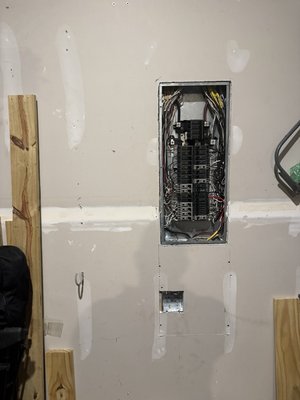 EV charger installation. - Installed a surface mounted, level two EV charger in the garage of a homeowner. The existing electrical panel was recessed into the wall so a recessed junction box with connecting conduit was installed inside the wall, then a junction box extension ring was used to transition to surface mounted conduit.