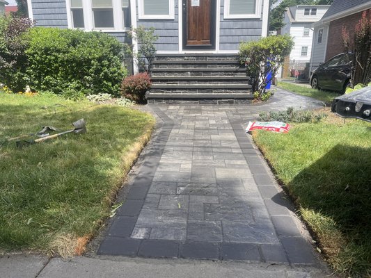 Walkways - Clean lines and a smooth flow — custom paver walkway installed to elevate curb appeal and guide you home the right way. Built by DivisionOne Masonry & Waterproofing. Walkways - Clean lines and a smooth flow — custom paver walkway installed to elevate curb appeal and guide you home the right way. Built by DivisionOne Masonry & Waterproofing.
