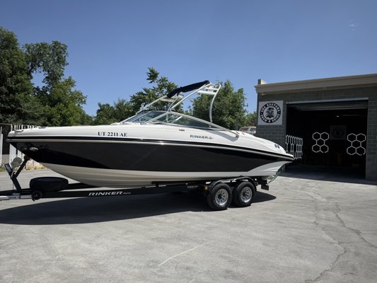 Rinker Captiva - This boat was Extremely oxidized and needed a full reconditioning and protective coating
We started off with removing the decals, then went to multi step wet sanding to remove oxidation, followed by a full high speed rotary cut to remove any marks left by sanding, then we did a 2 step polish to bring back out the bright white and mirrored black finish, we then put a CCI Revolution 6+ year ceramic coating on it to protect it from oxidizing again and making it a breeze to keep clean. We finished the boat up with a full interior detail and leather/vinyl protection. Rinker Captiva - This boat was Extremely oxidized and needed a full reconditioning and protective coating
We started off with removing the decals, then went to multi step wet sanding to remove oxidation, followed by a full high speed rotary cut to remove any marks left by sanding, then we did a 2 step polish to bring back out the bright white and mirrored black finish, we then put a CCI Revolution 6+ year ceramic coating on it to protect it from oxidizing again and making it a breeze to keep clean. We finished the boat up with a full interior detail and leather/vinyl protection.