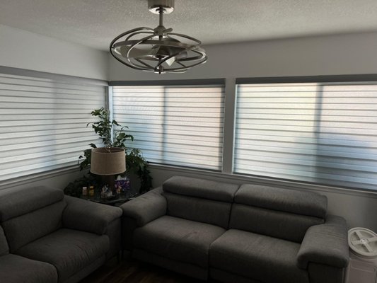 Automated Zebra Shades - For those seeking a blend of elegance and functionality, iL Progetto offers a remarkable collection of Horizontal Sheer Shades. These shades combine the delicate appearance of sheer fabric with the light control and privacy features of Zebra Shades. The horizontal fabric vanes maintain your view while offering softly diffused light when open. When closed, these shades effectively block incoming sunlight. Their unique design allows the shades to roll up into a fabric-covered headrail, preserving your unobstructed view.
These window treatments feature several carefully designed elements, including a continuous Cord Loop Operating System for smooth and easy adjustment across different window sizes. By producing our own Horizontal Sheer Shades, iL Progetto ensures stringent quality control, preventing the fabric vanes from detaching from the sheer panels.
Why Choose Zebra Shades?
Ideal for traditional and Modern style homes
Perfect for those who want both a sheer view and privacy