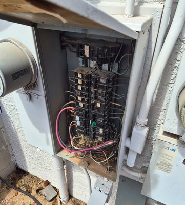 Panel Rejuvenation and Whole Home Surge Protection, 36 years old - This was an old, 36 year old panek with mismatched breakers, cut, burnt, exposed and damaged conductors, double and triple tapped circuits all over the place, loose connections causing melting points and old, faulty breakers.
I made room using tandem breakers after a load calculation showed plenty of room, which allowed for installation of a Whole Home Surge Protection Service and allowed me to separate a triple tapped set of circuits, preventing multiple fire hazards and repairing many more throughouts the panel. See photos for details. Panel Rejuvenation and Whole Home Surge Protection, 36 years old - This was an old, 36 year old panek with mismatched breakers, cut, burnt, exposed and damaged conductors, double and triple tapped circuits all over the place, loose connections causing melting points and old, faulty breakers.
I made room using tandem breakers after a load calculation showed plenty of room, which allowed for installation of a Whole Home Surge Protection Service and allowed me to separate a triple tapped set of circuits, preventing multiple fire hazards and repairing many more throughouts the panel. See photos for details.