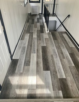 Vinyl Installation - Vinyl with a POP!!! Application of a liquid moisture barrier to the concrete slab and installed as a “floating” click and lock method. Vinyl Installation - Vinyl with a POP!!! Application of a liquid moisture barrier to the concrete slab and installed as a “floating” click and lock method.