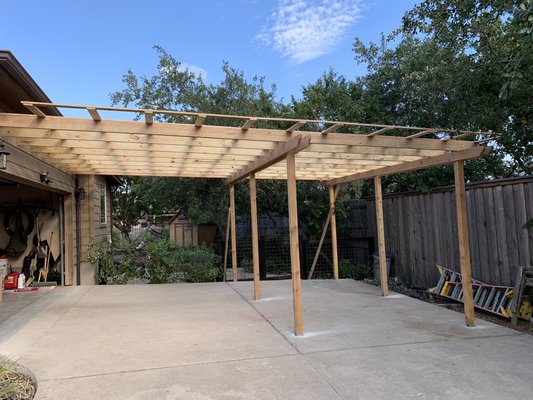Carport build - This is a build of a addition carport with sheet metal metal roofing . Carport build - This is a build of a addition carport with sheet metal metal roofing .