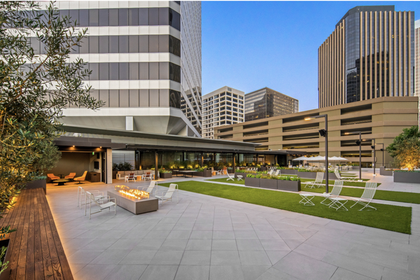 Commercial Artificial Turf Courtyard – Santa Monica Office Campus - Earth Design recently completed a commercial artificial turf installation at the outdoor plaza and courtyard areas of the office complex at 10100 Santa Monica Blvd in Los Angeles. These spaces are designed for daily use by tenants and visitors, requiring a landscape solution that remains beautiful while withstanding heavy foot traffic.
For this installation we used SYNLawn SYNAugustine 347, a premium synthetic turf featuring plant-based backing technology and the EnviroLoc™ system for superior durability in high-traffic commercial environments.
The new turf areas create lush green gathering spaces throughout the courtyard while eliminating watering, mowing, and ongoing lawn maintenance.
Commercial artificial turf is an excellent solution for office plazas, corporate campuses, rooftop amenity decks, hospitality spaces, and high-traffic courtyards throughout Los Angeles. Commercial Artificial Turf Courtyard – Santa Monica Office Campus - Earth Design recently completed a commercial artificial turf installation at the outdoor plaza and courtyard areas of the office complex at 10100 Santa Monica Blvd in Los Angeles. These spaces are designed for daily use by tenants and visitors, requiring a landscape solution that remains beautiful while withstanding heavy foot traffic.
For this installation we used SYNLawn SYNAugustine 347, a premium synthetic turf featuring plant-based backing technology and the EnviroLoc™ system for superior durability in high-traffic commercial environments.
The new turf areas create lush green gathering spaces throughout the courtyard while eliminating watering, mowing, and ongoing lawn maintenance.
Commercial artificial turf is an excellent solution for office plazas, corporate campuses, rooftop amenity decks, hospitality spaces, and high-traffic courtyards throughout Los Angeles.
