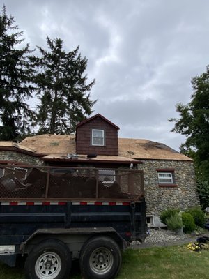 Full Tear Off and Resheet - This Project was Completed in Graham WA. A 1900SqFt House With an 8/12-10/12 Pitched Roof. It Got a Full Re-sheet (New Plywood) All Over and as well as extra vents for better ventilation. Full Tear Off and Resheet - This Project was Completed in Graham WA. A 1900SqFt House With an 8/12-10/12 Pitched Roof. It Got a Full Re-sheet (New Plywood) All Over and as well as extra vents for better ventilation.