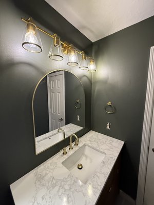 Bathroom Remodel - This bathroom remodel started with a hidden nightmare: water damage and mold lurking right behind the walls. Thankfully, we caught it just in time! We completely gutted the space, safely remediated the hazards, and rebuilt it into a flawless modern retreat. With deep, moody paint, custom quartz countertops, and stunning gold fixtures, we turned a major headache into the ultimate luxury oasis. Bathroom Remodel - This bathroom remodel started with a hidden nightmare: water damage and mold lurking right behind the walls. Thankfully, we caught it just in time! We completely gutted the space, safely remediated the hazards, and rebuilt it into a flawless modern retreat. With deep, moody paint, custom quartz countertops, and stunning gold fixtures, we turned a major headache into the ultimate luxury oasis.