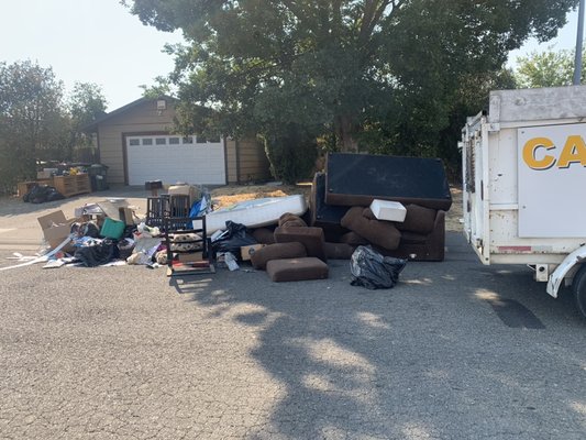 Junk removal - Someone left a Lot of junk outside of the property￼￼