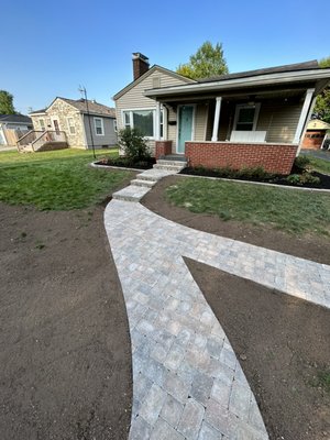 Paver walkway and retaining wall with steps - Here at Westrick Landscape, we specialize in creating beautiful and functional outdoor spaces through expert hardscaping services. From patios and walkways to retaining walls and fire pits, our team of skilled professionals is dedicated to enhancing your property's aesthetic appeal and usability with durable and stunning hardscape features. Paver walkway and retaining wall with steps - Here at Westrick Landscape, we specialize in creating beautiful and functional outdoor spaces through expert hardscaping services. From patios and walkways to retaining walls and fire pits, our team of skilled professionals is dedicated to enhancing your property's aesthetic appeal and usability with durable and stunning hardscape features.
