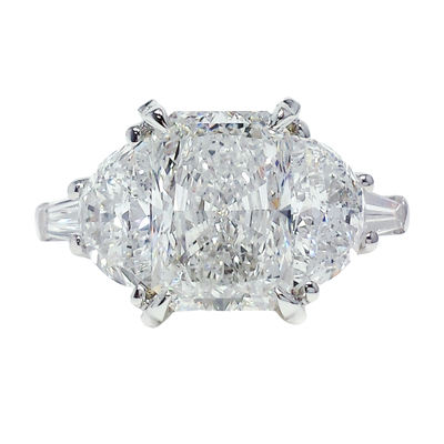 Custom Radiant Cut Lab Diamond Ring - This custom ring is a true work of art, designed and crafted to perfection. Featuring a 3.7ct radiant-cut lab diamond as the centerpiece, it’s complemented by 1ctw half-moon lab diamond accents and 0.5ctw tapered baguettes for a modern and elegant look. Small round diamonds on the prongs add a touch of brilliance to this already stunning piece.
From the CAD design to final approval, every detail was carefully tailored to bring our client’s vision to life. This project highlights our expertise in creating bespoke jewelry that combines innovation and timeless design. Custom Radiant Cut Lab Diamond Ring - This custom ring is a true work of art, designed and crafted to perfection. Featuring a 3.7ct radiant-cut lab diamond as the centerpiece, it’s complemented by 1ctw half-moon lab diamond accents and 0.5ctw tapered baguettes for a modern and elegant look. Small round diamonds on the prongs add a touch of brilliance to this already stunning piece.
From the CAD design to final approval, every detail was carefully tailored to bring our client’s vision to life. This project highlights our expertise in creating bespoke jewelry that combines innovation and timeless design.