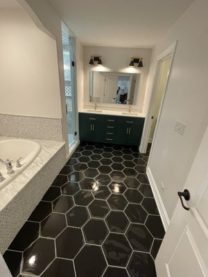 Bathroom remodeling - Whole master bathroom remodeled, including new vanity, lights, shower, tiles, paintwork.