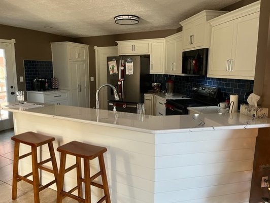Kitchen Remodel - This remodel included adding all new cabinets and counters. We added a pop of color with this tile backsplash. Kitchen Remodel - This remodel included adding all new cabinets and counters. We added a pop of color with this tile backsplash.