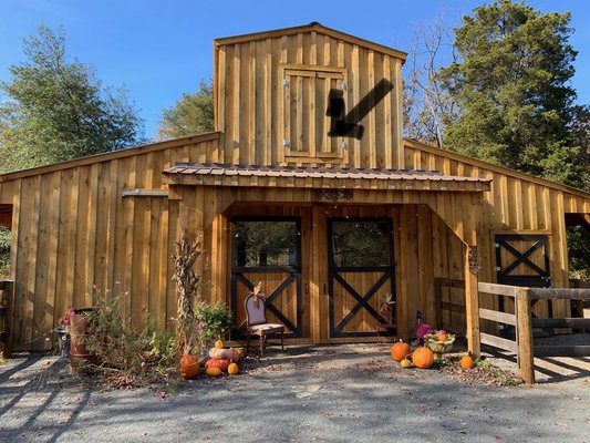 Custom built barn from rough sawn poplar lumber.  Stained, painted and sealed by us. - barn built from the ground up with custom additions and accents.  Stained, custom doors and painting.  Sealed to last for year.  Built from rough cut lumber.  Turned out beautiful and the horses love it to.