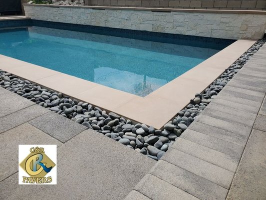 Pool Decks - Pool Deck Pavers Contractor in San Diego
Realize your dream of a beautiful pool deck to compliment your pool and landscaping with pavers. Pavers are beautiful, durable, practical and functional making them an excellent choice for your pool deck.

Your poolside area can be much more than just an outdoor area. It can be a beautiful extension of your home representing your individual style. Pavers come in a wide array of unique colors and patterns making it easy to satisfy any taste. Choose from a classic or traditional look, rustic or natural complimenting the natural beauty of your pool and landscaping. With pavers, the choices of colors, textures, shapes and sizes are endless.