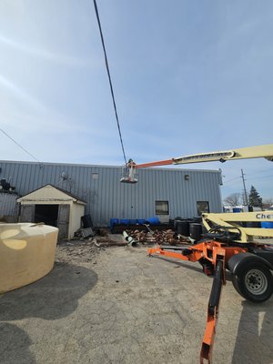 Overhead wiring - Overhead wiring 500 feet 11 cameras. Cables were torn down by a truck so we were called to rerun them. Everything is tight and well above reach from all the trucks in this high traffic area. Overhead wiring - Overhead wiring 500 feet 11 cameras. Cables were torn down by a truck so we were called to rerun them. Everything is tight and well above reach from all the trucks in this high traffic area.
