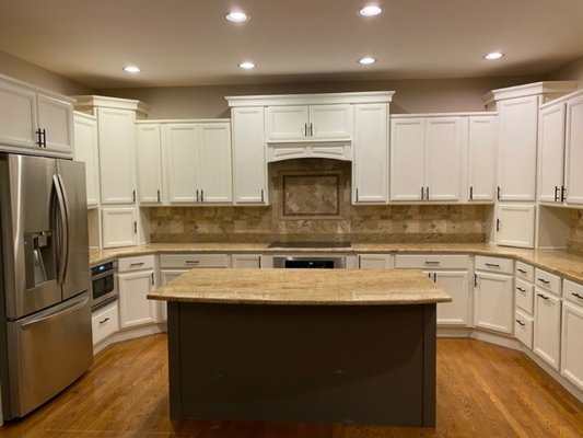 Kitchen Cabinets Spraying - This kitchen cabinets project was done with paint sprayer, it was brown color before. We did all the prep work and follow the process, the final result was astonished, it gave the cabinets a modern fresh look! For this project we used top quality primer and paint. Not only this kitchen cabinets look awesome, but the paint work will last a long time! Kitchen Cabinets Spraying - This kitchen cabinets project was done with paint sprayer, it was brown color before. We did all the prep work and follow the process, the final result was astonished, it gave the cabinets a modern fresh look! For this project we used top quality primer and paint. Not only this kitchen cabinets look awesome, but the paint work will last a long time!