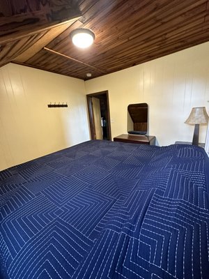 Air BNB sleeps 4-6 people - Above the main house is a 2 bedroom air bnb which has a full kitchen, 1 full bathroom with tub and shower, 1 bar, fooz ball table, dart board, wood stove, flat screen TV, wifi and large deck.