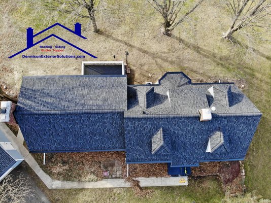 Dennison Exterior Solutions Roof, Seamless Gutters & Gutter Topper Project in Benton Harbor Michigan - Dennison Exterior Solutions & Gutter Topper as Roofing Contractors in Benton Harbor Michigan installed CertainTeed’s Lifetime Warranty Class 4 Hail Rated Moire Black NorthGate Shingles with new white seamless aluminum gutters and Downspouts, with Black Lifetime Warranty Gutter Topper that includes the Heated Ice Release System