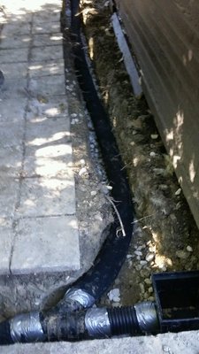 French Drain, swale, and pump installation - Installation of a french drain, rock swale, pump, and exit line. French Drain, swale, and pump installation - Installation of a french drain, rock swale, pump, and exit line.