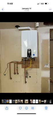 Water heater - Replaced undersized tankless with a new larger unit with a built in recirculating pump.