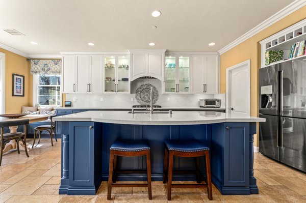 BLUE AND WHITE DRAMA IN THE KITCHEN - After years of dreaming, planning, and saving, our client finally upgraded their kitchen. And what a upgrade it is! These white and blue cabinets are absolutely beautiful. They add a touch of class to any home, but with a modern twist.
They love spending time in the kitchen, and now can do it even more comfortably. With all this new counter space, They can finally spread out and cook up a storm. The best part is that the whole family can gather around the island and help out.
It's a kitchen dream come true! BLUE AND WHITE DRAMA IN THE KITCHEN - After years of dreaming, planning, and saving, our client finally upgraded their kitchen. And what a upgrade it is! These white and blue cabinets are absolutely beautiful. They add a touch of class to any home, but with a modern twist.
They love spending time in the kitchen, and now can do it even more comfortably. With all this new counter space, They can finally spread out and cook up a storm. The best part is that the whole family can gather around the island and help out.
It's a kitchen dream come true!