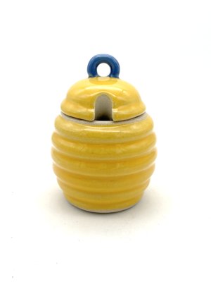 Honeypot - Brighten your kitchen with this charming Beehive Honeypot, a colorful and sculpted addition designed to add cheer to your day. Crafted from durable stoneware pottery with non-toxic glazes, this 8oz jar features a whimsical donut handle and a convenient dipper rest. Microwave, oven, and dishwasher safe, it's both practical and delightful. Honeypot - Brighten your kitchen with this charming Beehive Honeypot, a colorful and sculpted addition designed to add cheer to your day. Crafted from durable stoneware pottery with non-toxic glazes, this 8oz jar features a whimsical donut handle and a convenient dipper rest. Microwave, oven, and dishwasher safe, it's both practical and delightful.