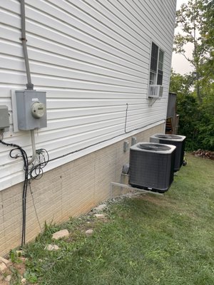 Hvac install - Installed new hvac system for clients. The old hvac system were installed on a cement pad in the dirt. They were also under the deck where the client wanted to hard scape and add a bar. 
The new systems are mounted on the side of the foundation which allows for better exchange and keeps them from getting destroyed by the elements. Also (it looks sharper)