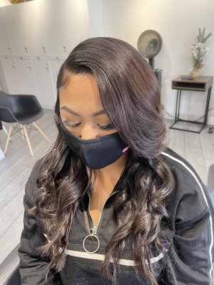 Extensions - Tape-in extensions are great if you want to temporarily lengthen your hair or add in some faux-highlights, as they aren’t permanent and are relatively simple to put in. They do not require special heat tools, so they can be applied at home without the assistance of a stylist.[1] You will first need to section off the top portion of your hair. Then, slowly tape in the extension one by one. You will have to be careful while wearing the extensions, as they're very prone to tangling. Brush your hair more frequently and take extra time in the shower.