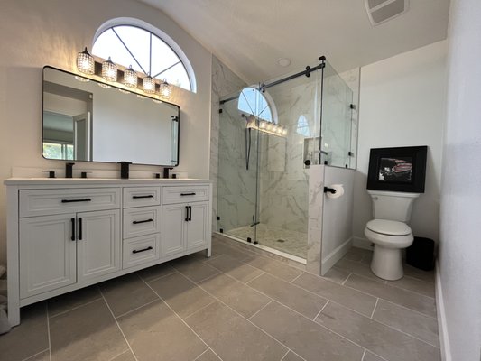 Bathroom Remodel - We came in and installed a custom framed mirror, along with the popular barn style shower door. We were able to accommodate the style our customers requested for both applications. Bathroom Remodel - We came in and installed a custom framed mirror, along with the popular barn style shower door. We were able to accommodate the style our customers requested for both applications.
