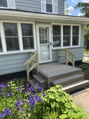 Front Step Remodel - The front steps went right to the door with no landing to stand on while opening and closing the door. We changed the design to add a nice landing and steps to go to all three sidewalks. Front Step Remodel - The front steps went right to the door with no landing to stand on while opening and closing the door. We changed the design to add a nice landing and steps to go to all three sidewalks.