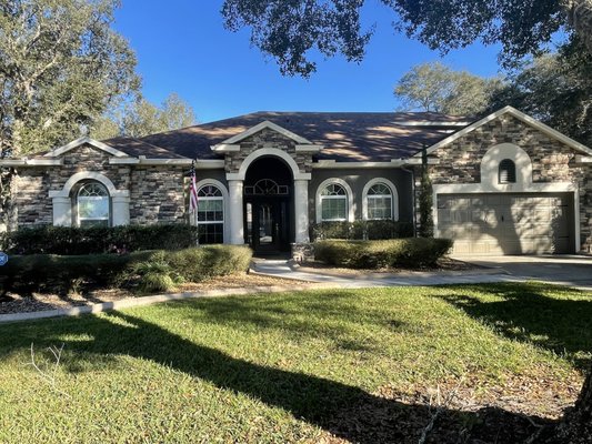 Exterior paiting 2022 - This was an exterior re-paint for a customer that I've done many jobs for in the past. There was a lot of stone to tape off. Came out great.