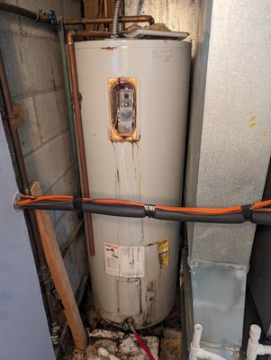 Water Heater Replacement - This water heater was a difficult one to do. I had to install the toilet and drop the water heater to the floor to get it under the line set for the furnace. After all was said and done I managed to get the new tank in without damaging anything. Water Heater Replacement - This water heater was a difficult one to do. I had to install the toilet and drop the water heater to the floor to get it under the line set for the furnace. After all was said and done I managed to get the new tank in without damaging anything.